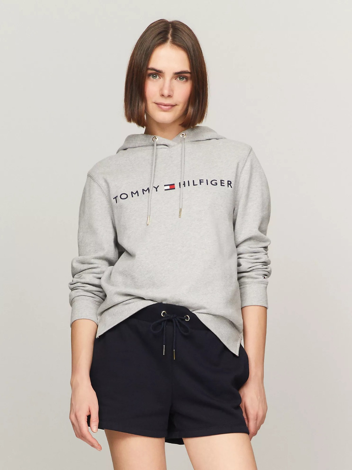 WhatsApp Image 2025-10-06 at 3.57.23 PM Embroidered Tommy Logo Hoodie-Grey Heather - Image 1